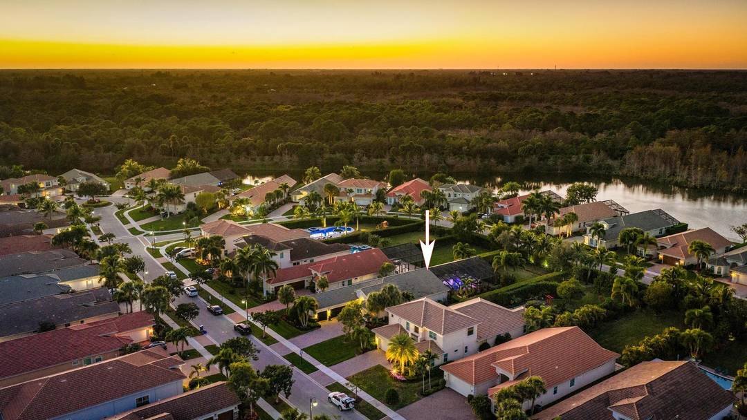 Exquisite 3 bedroom, 3 full bathroom plus office single family pool home located on a massive.