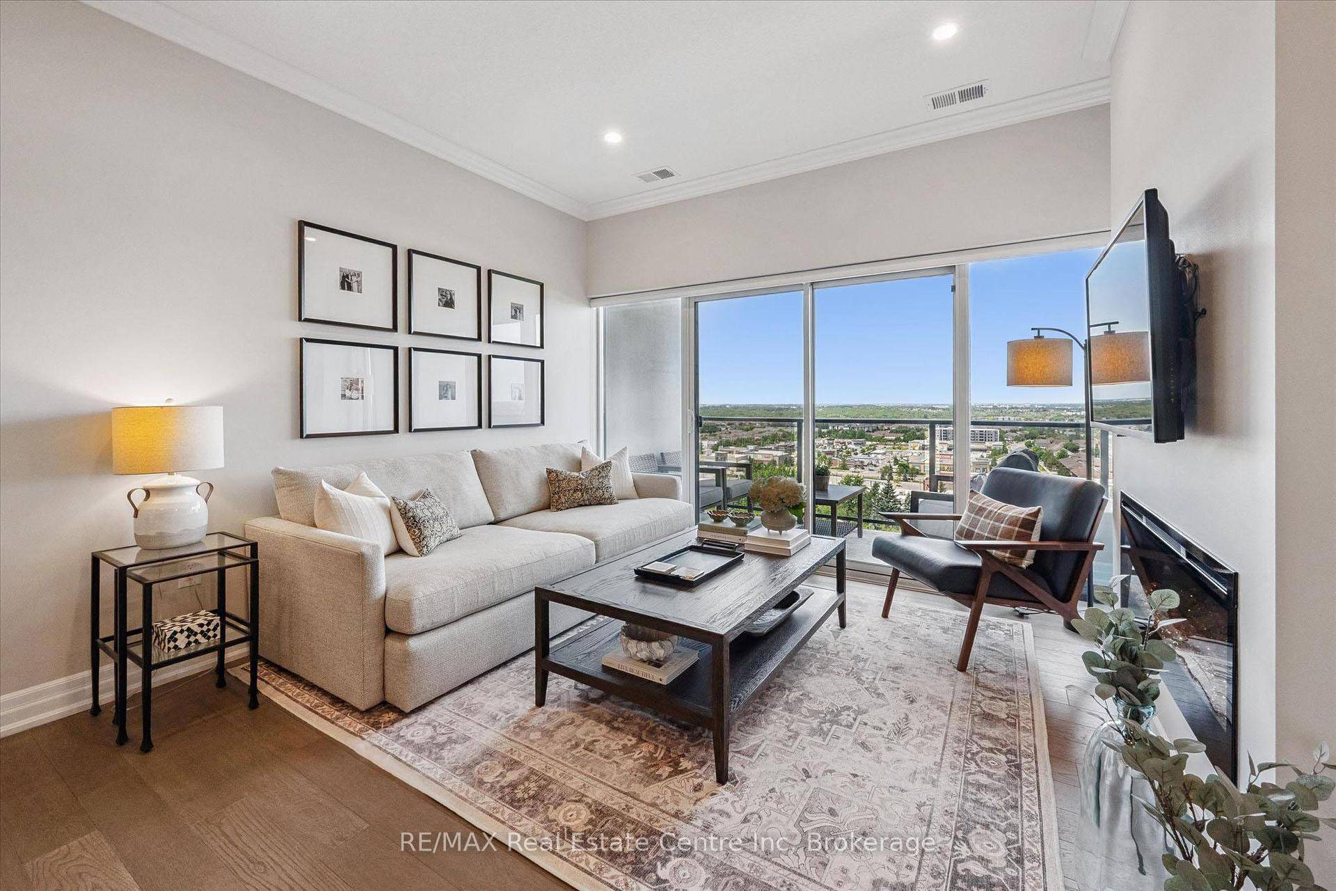 Welcome to 1010 1880 Gordon St, elegant 1 bdrm den condo perched high above Guelph's sought after south end !