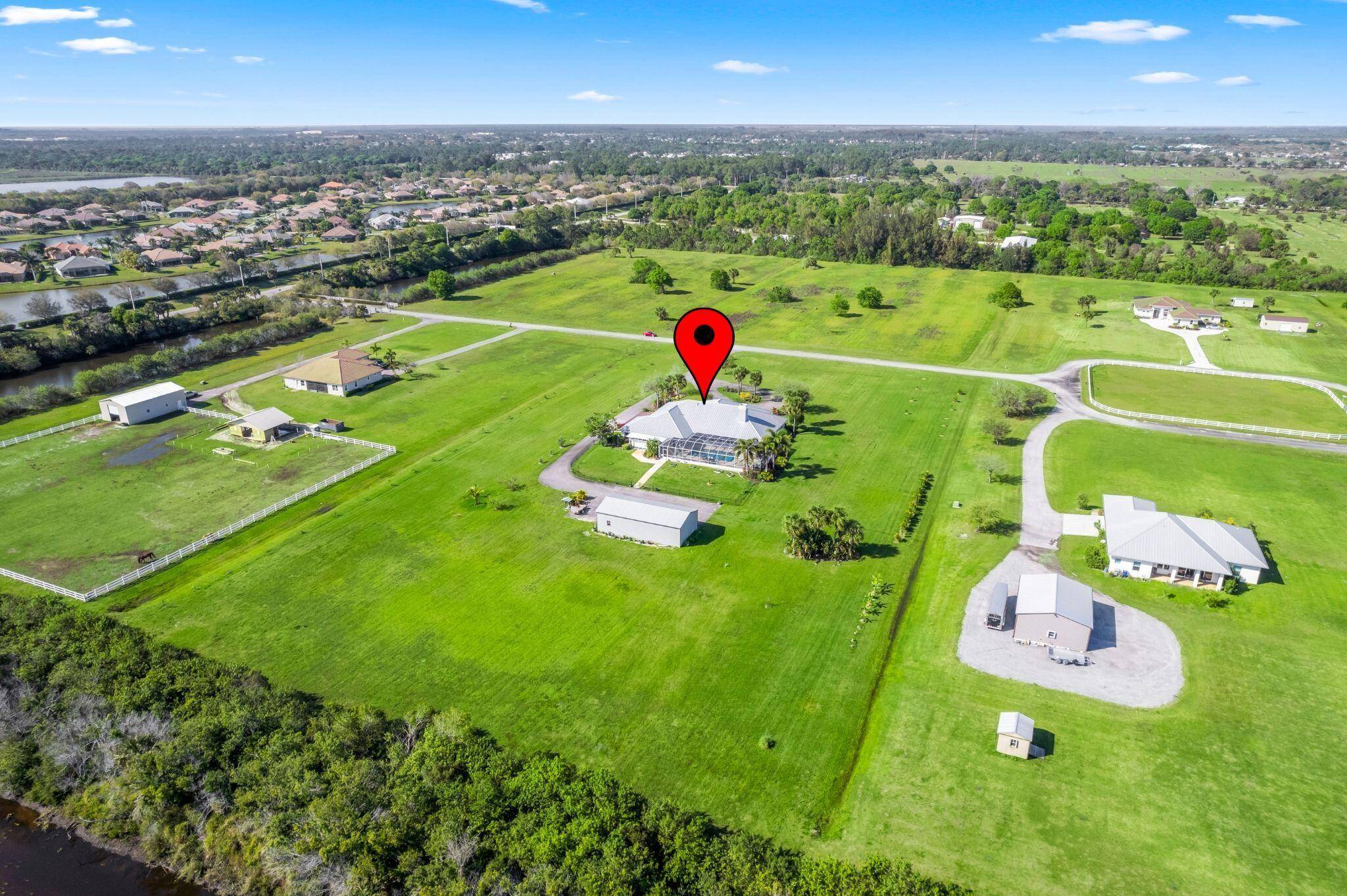 8135 White Fences Lane Private Multi generational Acreage Estate with Endless PossibilitiesWelcome to 8135 White Fences Lane, a serene and beautifully appointed estate located in one of Vero Beach's most ...