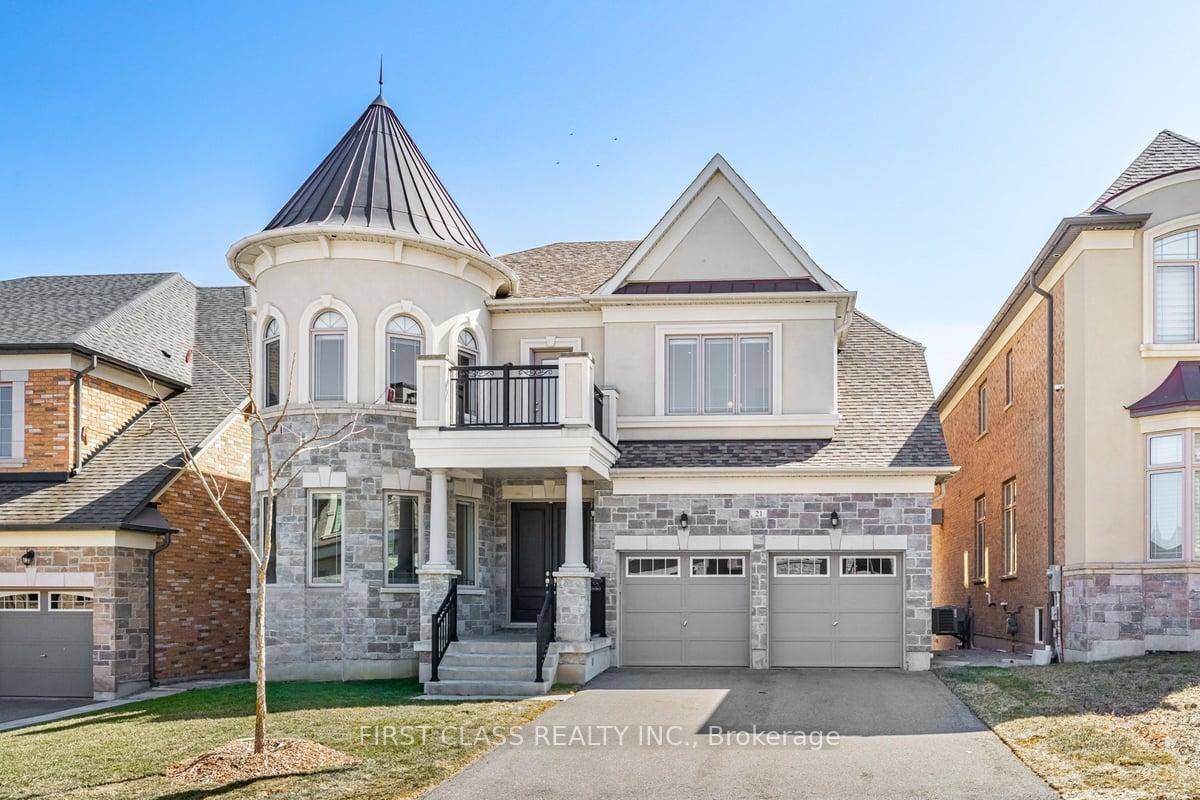 Nestled in prestigious Patterson community, this stunning detached home offers over 4, 000 sq.
