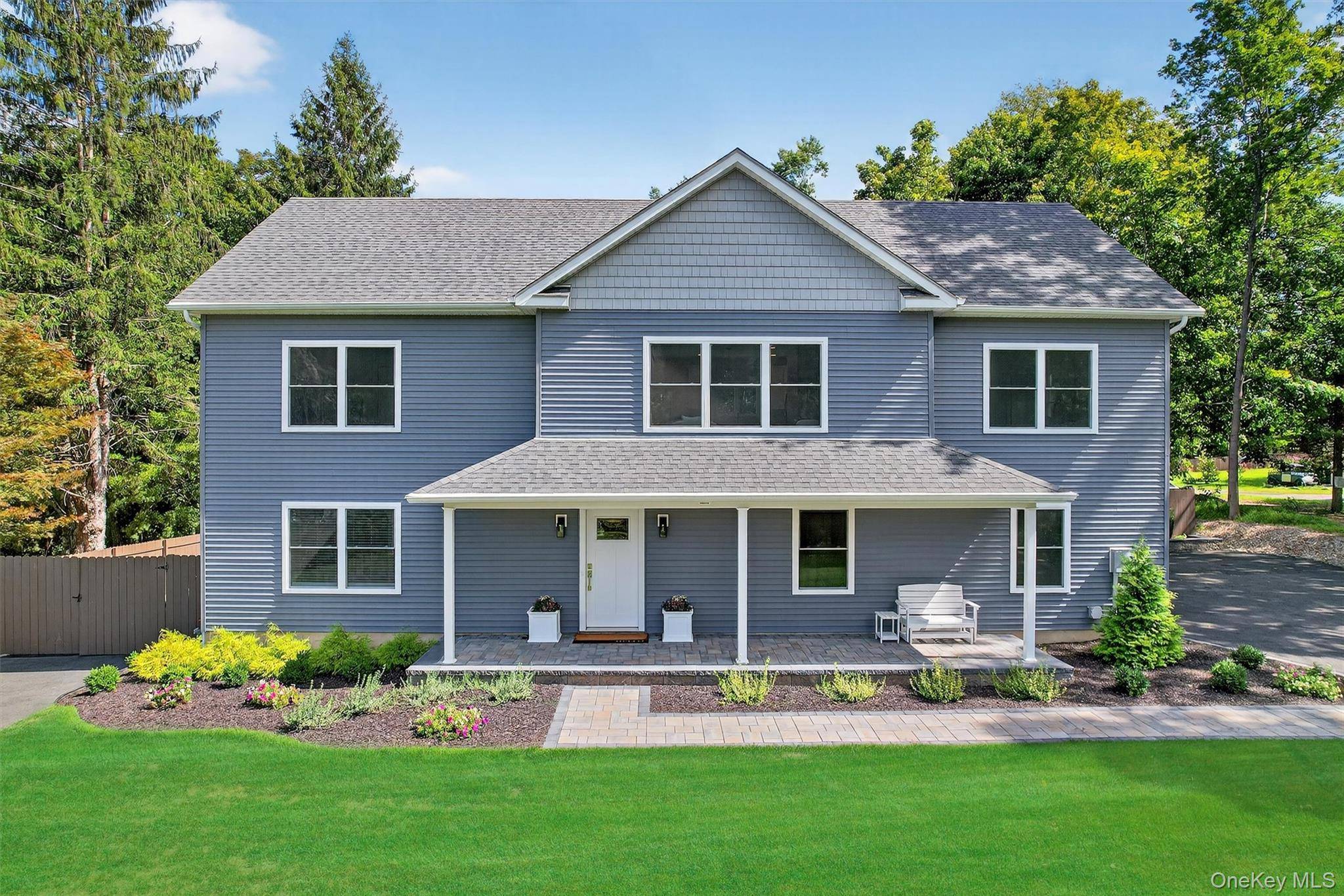 Welcome to 118 Old Dutch Hollow Road, an exquisite new residence situated on a beautifully landscaped 7.