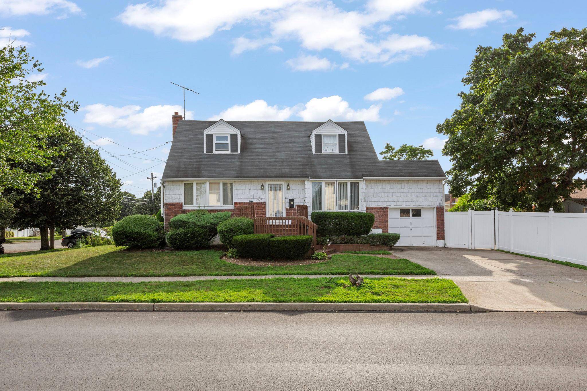 Spacious 3 Bedroom, 2 Full Bath Expanded Cape Located In The Heart Of Oceanside, NY.