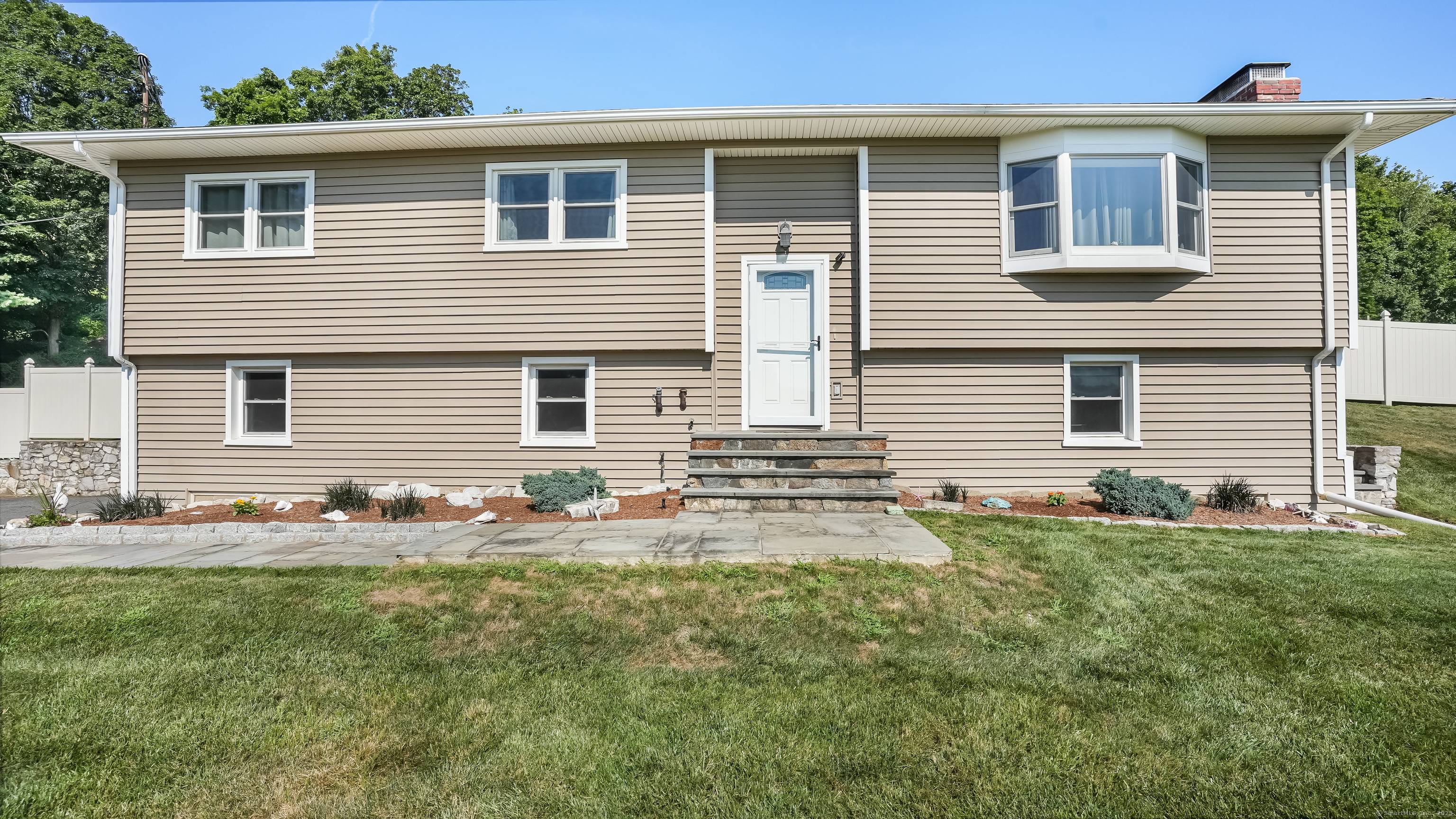 Impressively Upgraded Home with NEW Barn, Fenced Backyard, and Superb Location !