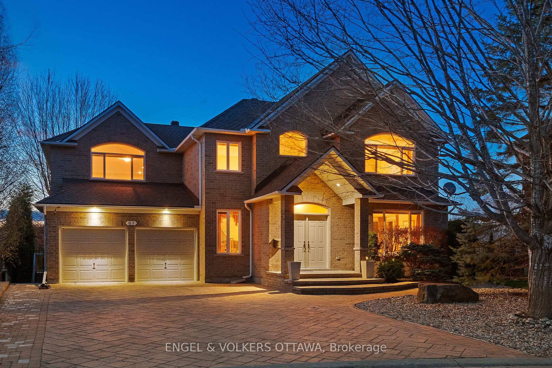 A distinguished 5 bedroom, 5 bathroom estate situated on one of Kanata Lakes' most expansive walkout lots over 13, 000 sq.