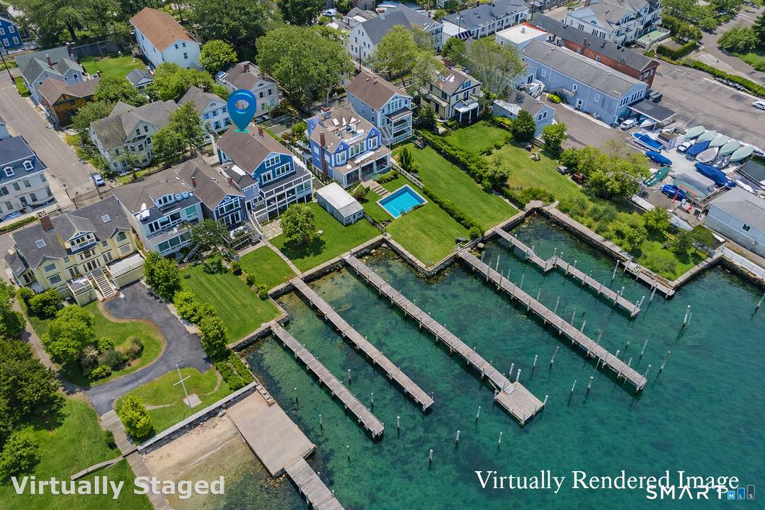 At the edge of Stonington Harbor, where sailboats move slowly through the water and the village wakes each morning to the rhythm of the tide, 88 Water Street offers a ...