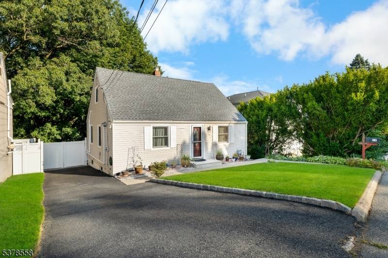 Welcome to this stunning and well maintained cape cod home in Rockaway.