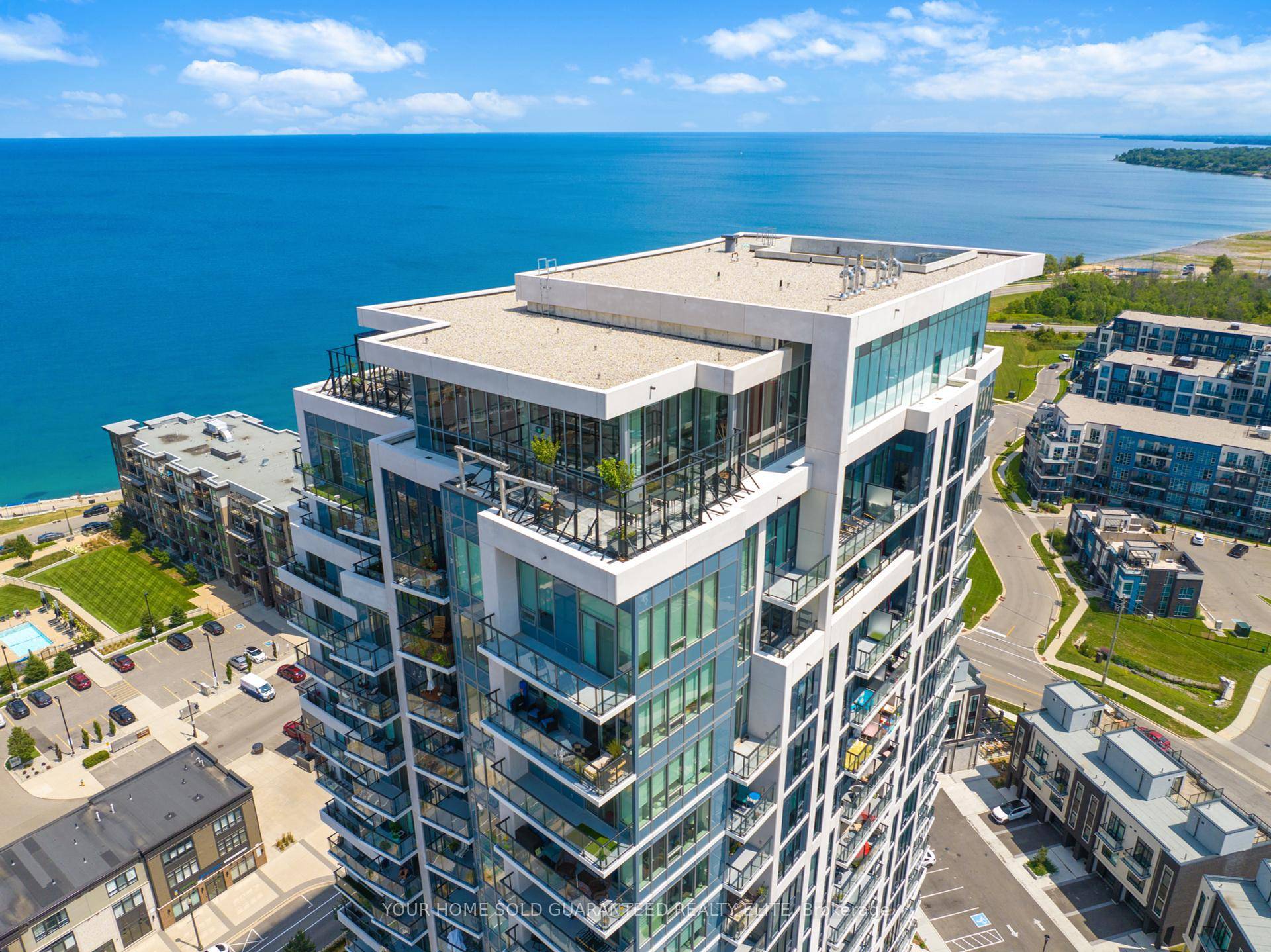 STUNNING CONDO WITH LAKE ONTARIO VIEWS IN GRIMSBY ON THE LAKE !