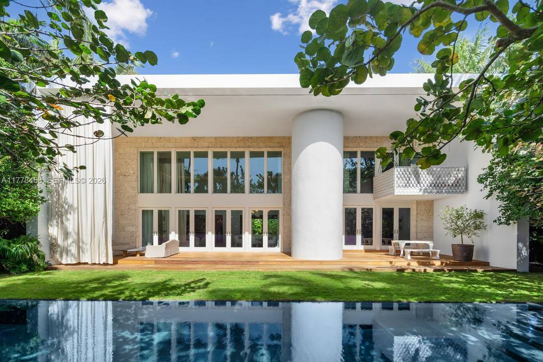 Designed by world renowned architect Chad Oppenheim, Villa Allegra is a stunning tropical modern home on Sunset Island III, one of the most coveted gated communities on Miami Beach.