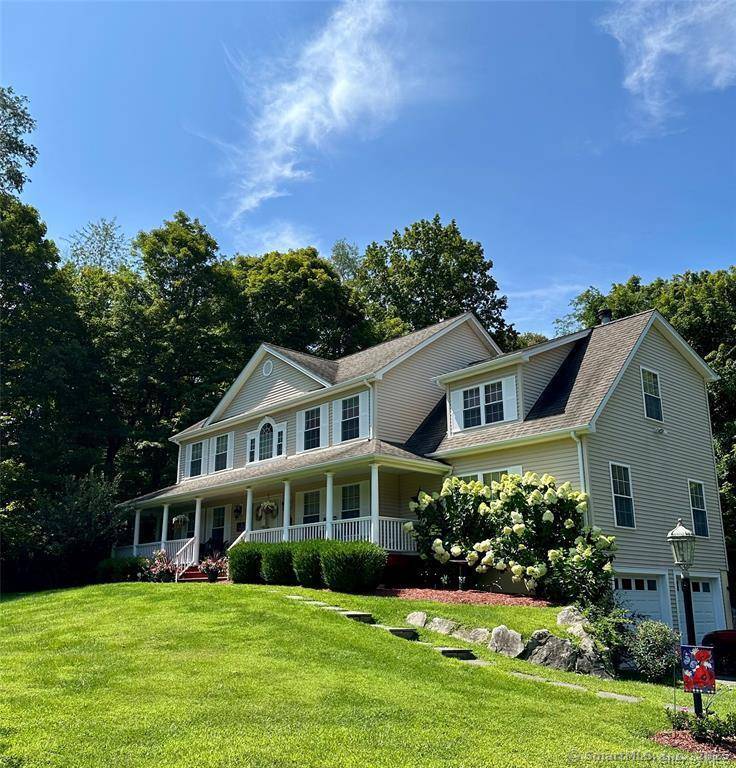 Nestled in the foothills of the Berkshires, this exquisite front Porch Center Hall Colonial sits perfectly on a beautiful rolling 1.