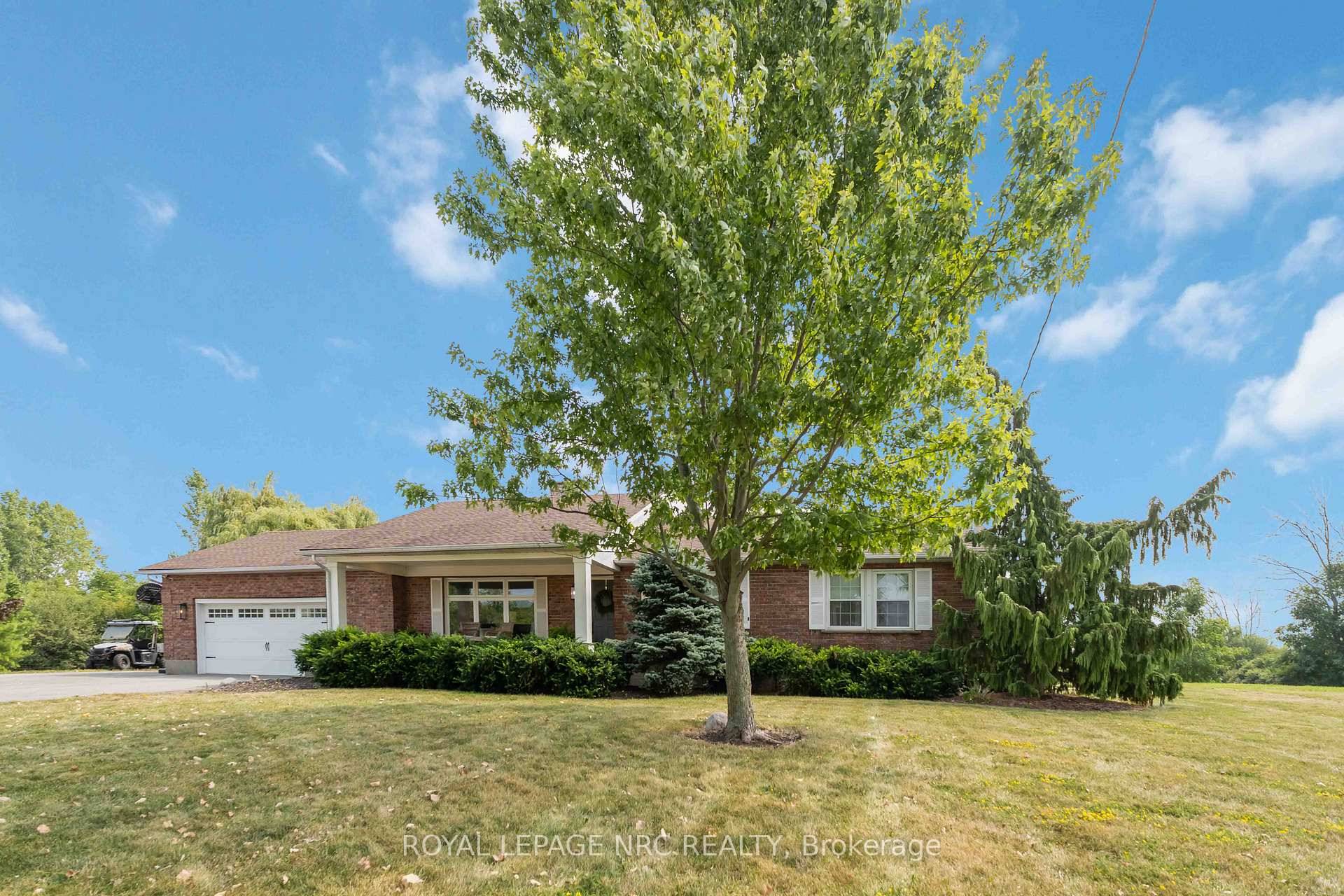 Escape the ordinary and embrace the lifestyle you deserve with this beautifully maintained 3 bedroom bungalow nestled on a full acre of land.