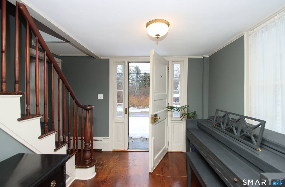 This antique salt box home, in the federal half house style brings the best of old and new !