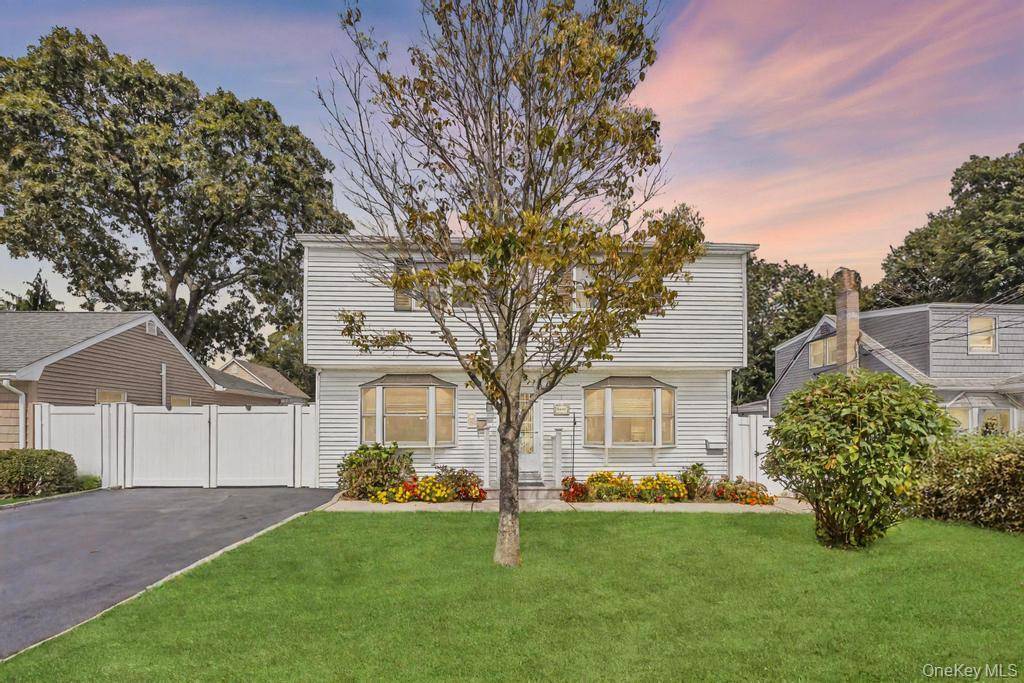 Charming Colonial with legal accessory apartment offers 2 bedrooms and 1.