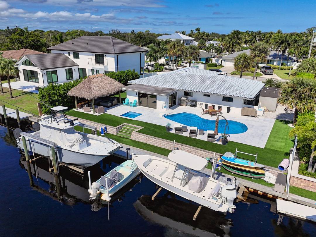 Boaters Dream Rental. Two Boat Lifts Available For Use With This Beautifully Renovated Waterfront Pool Home.