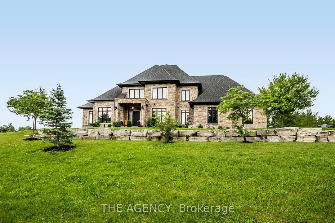 Custom Luxury Estate at 7645 Maltby Rd E !