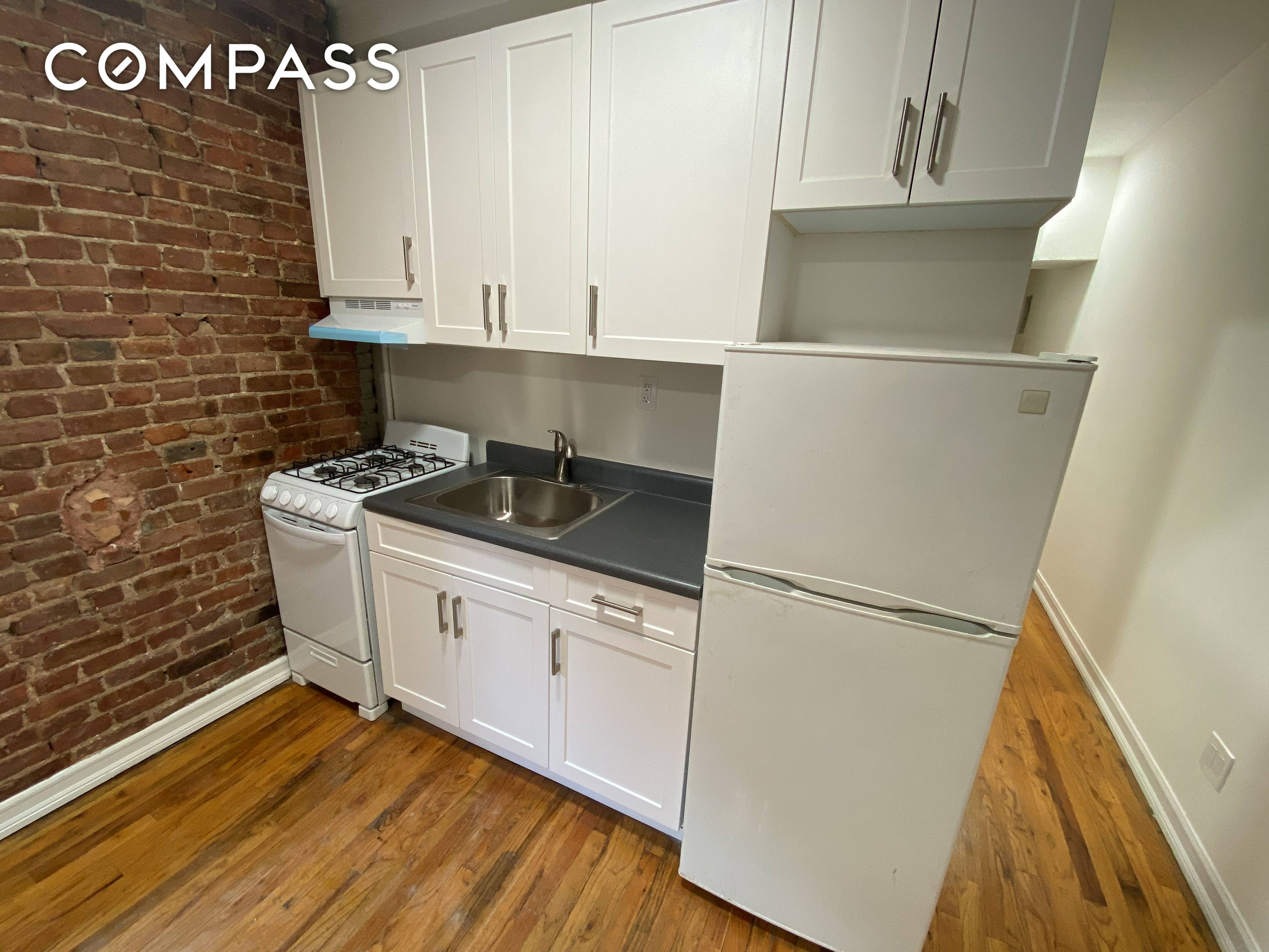 Upper East Side True 2BD 1BA with Windowed Kitchen, Exposed Brick, Hardwood Floors, Separate Living Room and Laundry in Building This economical two bedroom home features sprawling hardwood floors, a ...