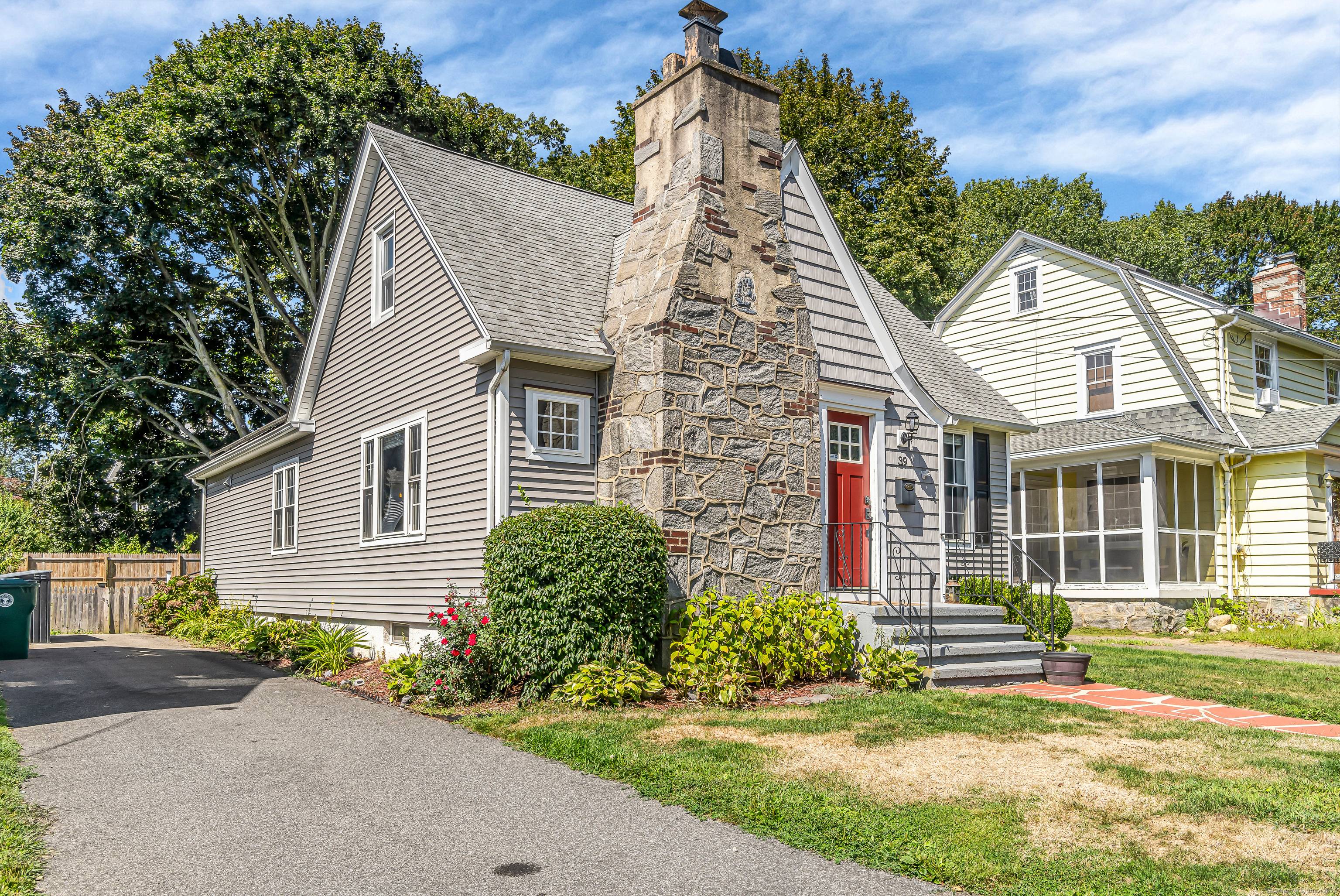 Step inside this beautifully updated home in the highly sought after Paradise Green area, offering an exceptional open floor plan with soaring ceilings and gleaming hardwood floors, all centered around ...