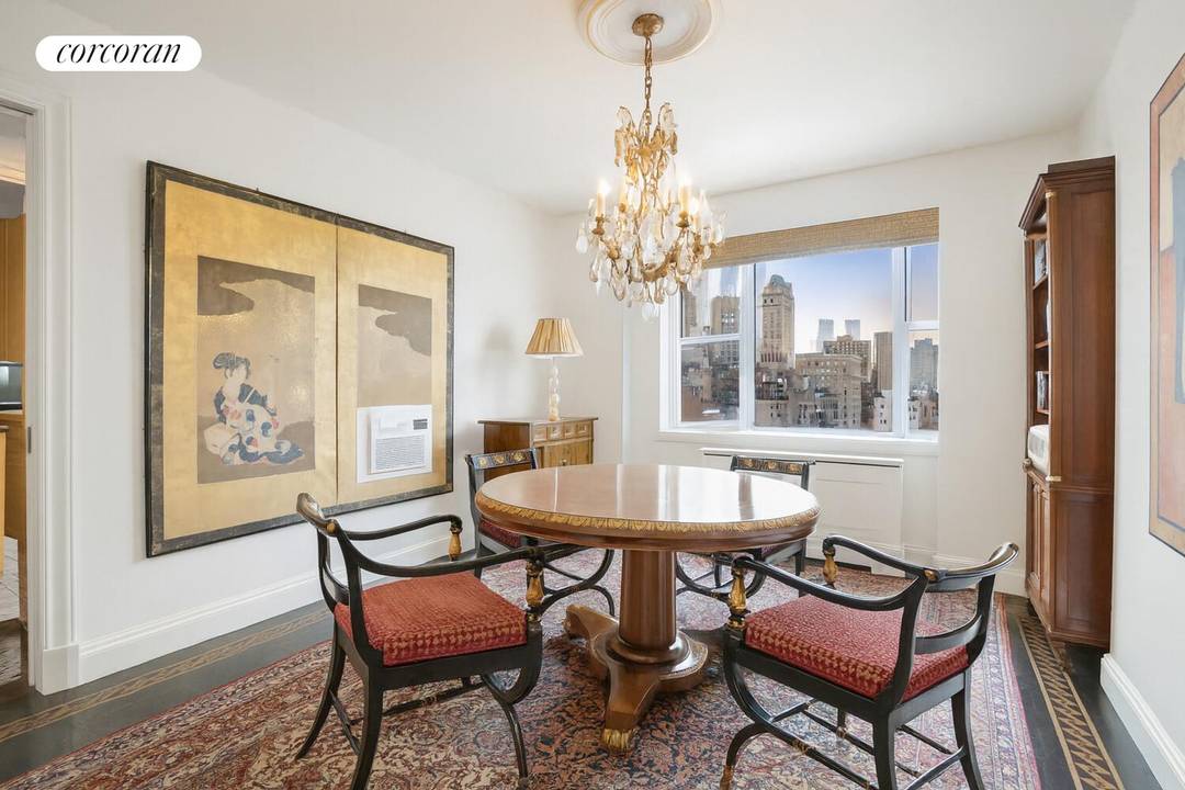 Enter this immaculate, light filled Classic 6 into the stunning entrance foyer replete with beautiful custom crafted inlaid wood floors.