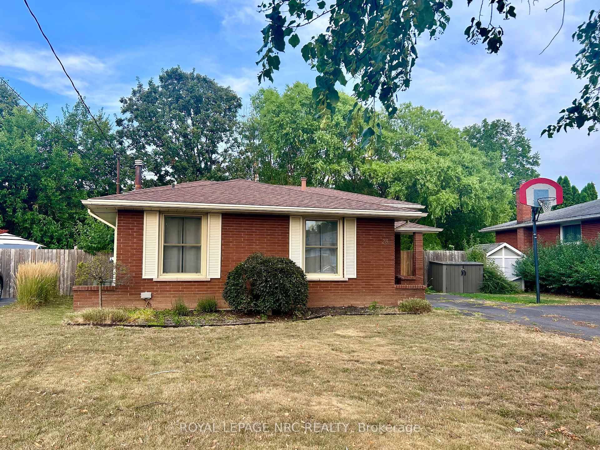 Spacious and well maintained 4 level back split located on a quiet, mature street in central St.