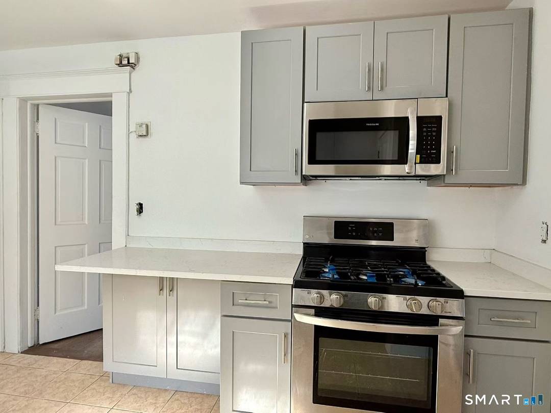 Spacious, heart of Stamford 2 Family with great potential.