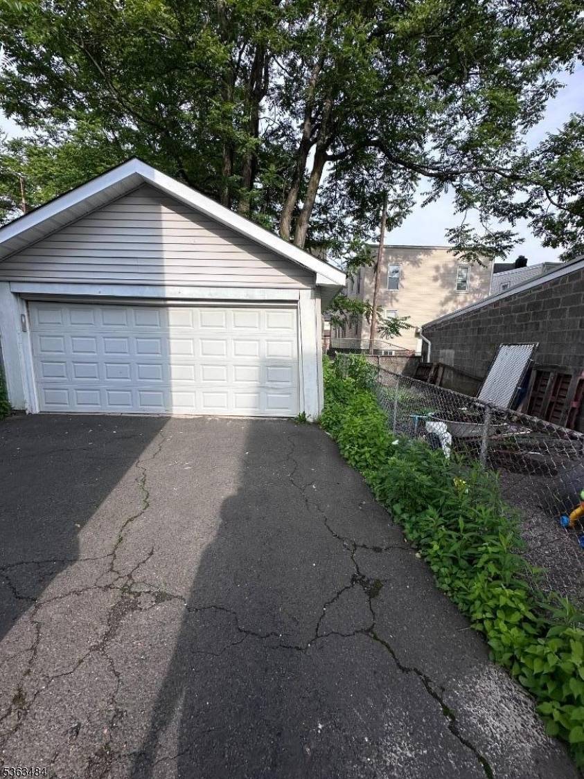This recently updated two family home features a finished basement and a bonus attic space.