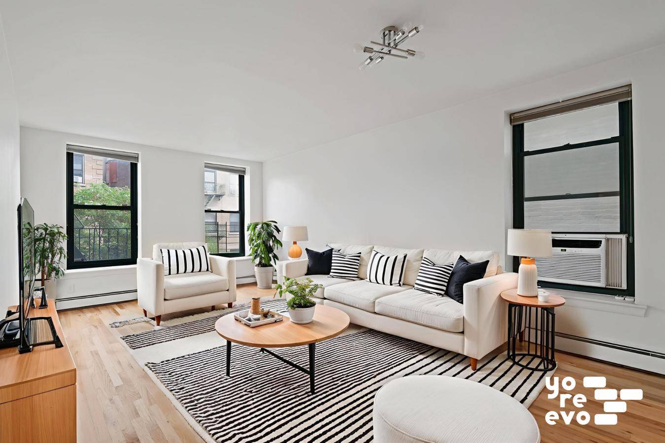 Welcome to 352 West 117th Street 5G, a sun filled two bedroom condo in prime West Harlem, perfectly positioned across from Morningside Park.