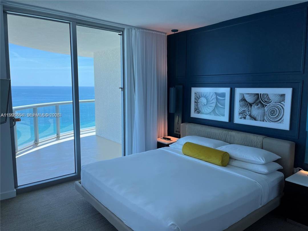 SPECTACULAR OCEAN FRONT, fully furnished Condo Hotel unit in exclusive SOLE Building.