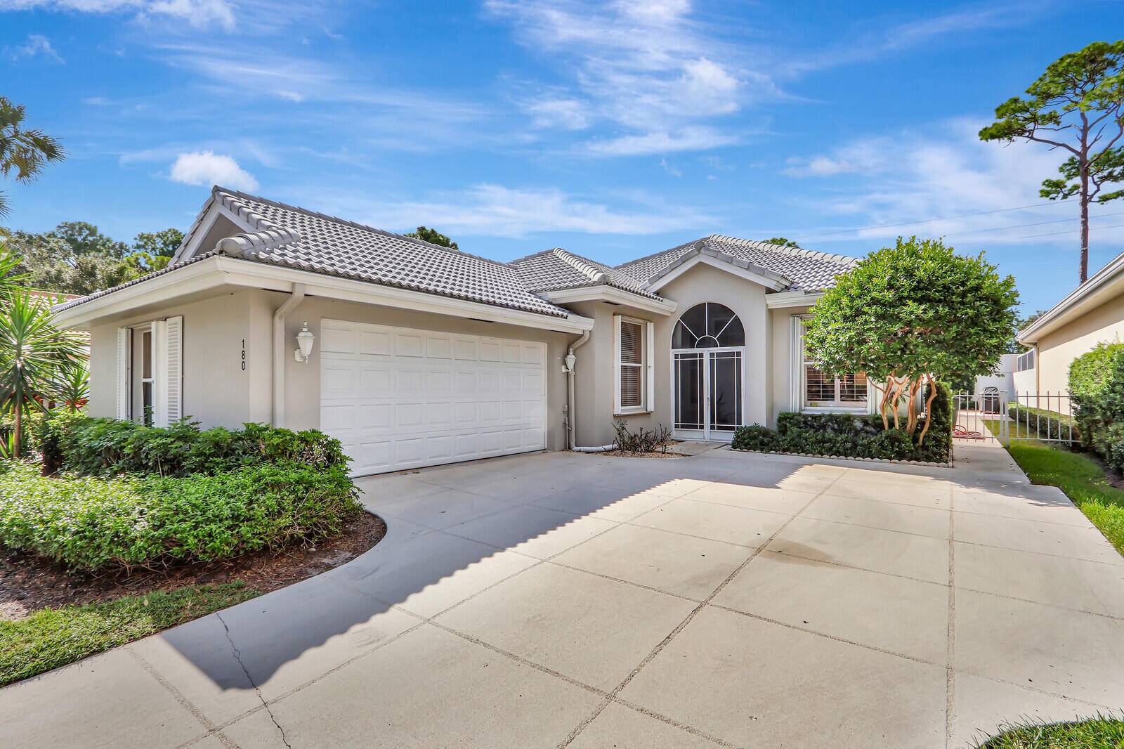 NOW SHOWING Indulge in luxury with this three bedroom, two bathroom home in The Hamptons, Jupiter's sought after community.