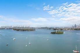 Rare Venetian Islands opportunity at 9 Island Avenue including 40 ft boat slip, 3 assigned parking spaces, and private storage amenities rarely available together in Miami Beach.