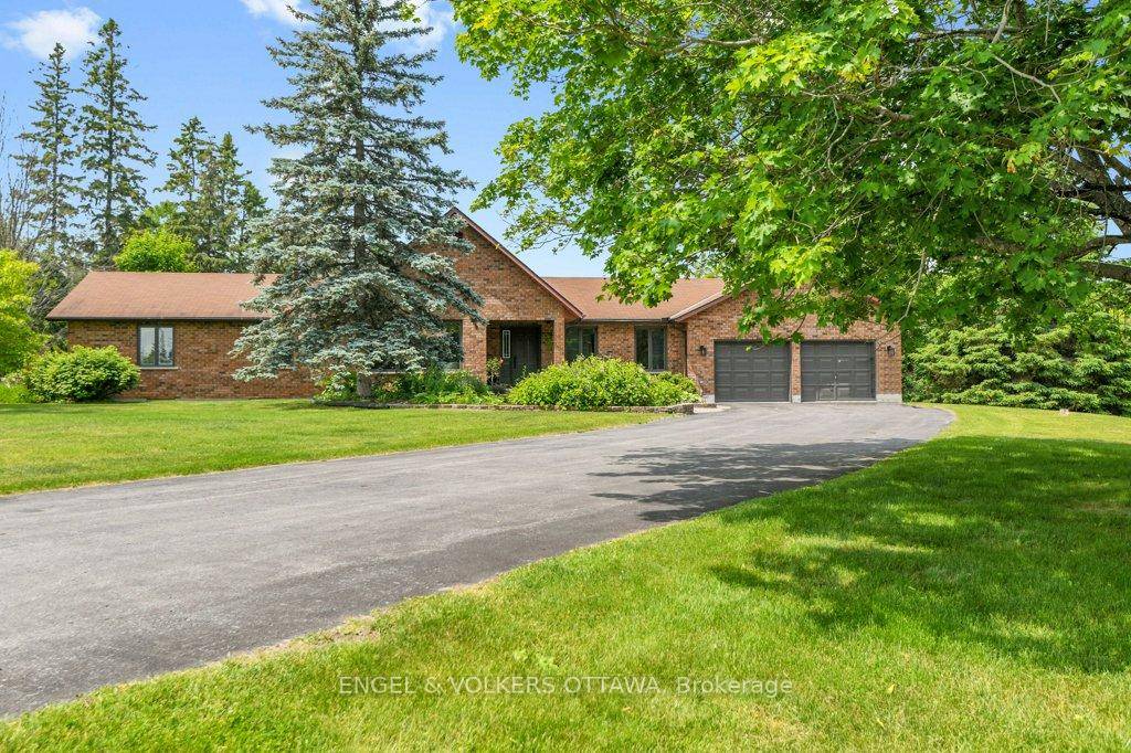 A handsome all brick bungalow with nearly 500 feet of frontage, just minutes from Hwy 17 and the village of Almonte.