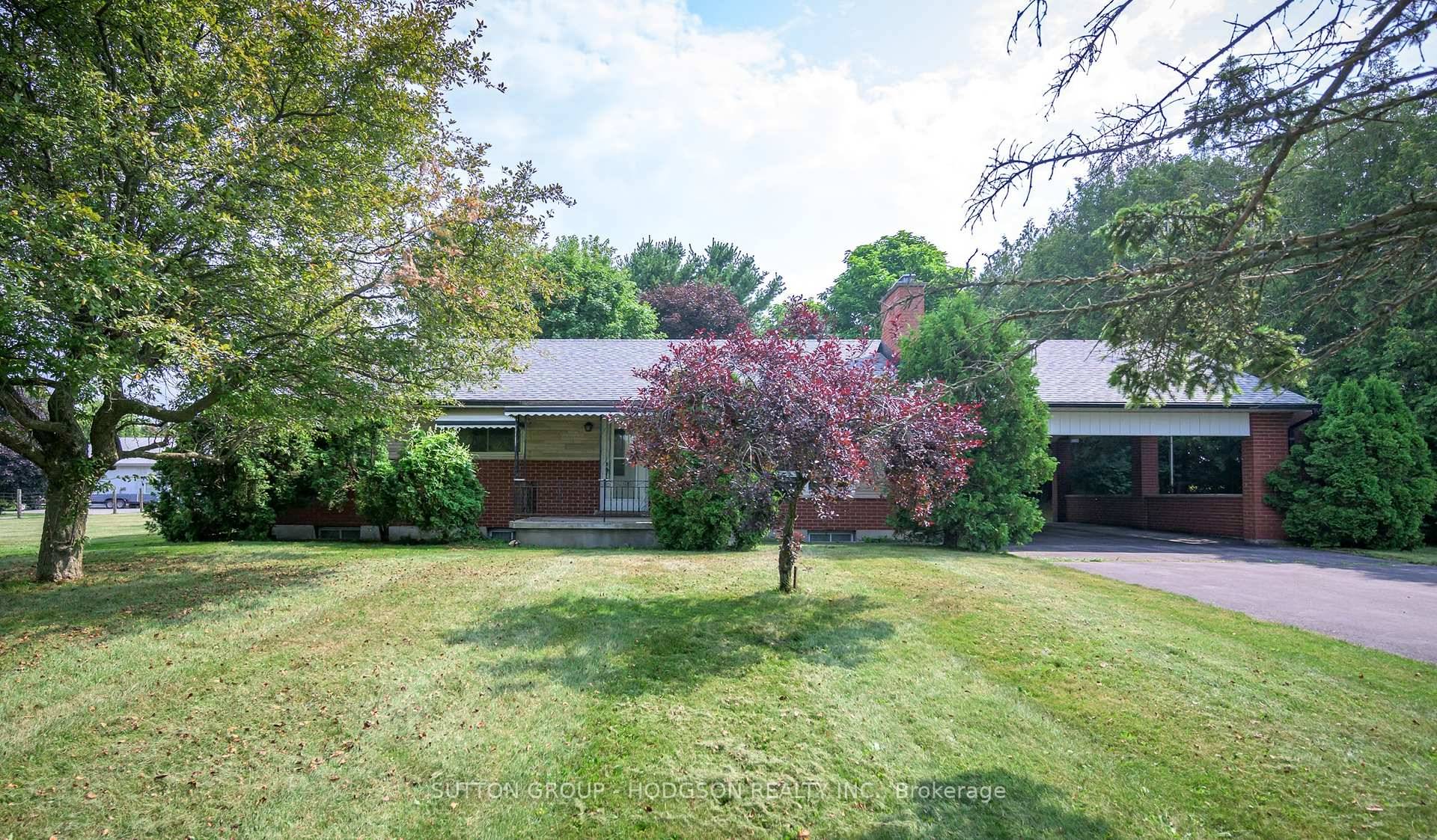 Looking for a beautiful property just a heartbeat from town that is almost one acre ?