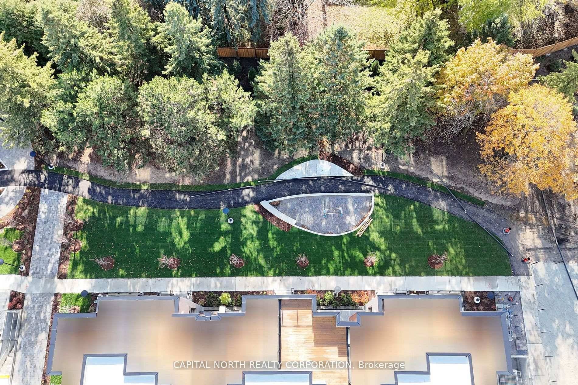 Bright 2 bedroom townhome with rooftop terrace and south exposure overlooking greenery.