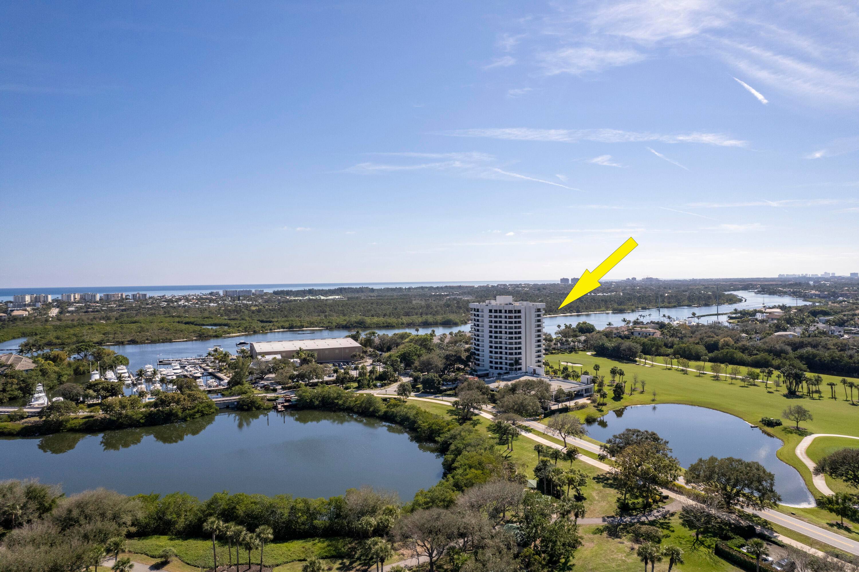 Enter thru beautiful wood double doors to an unparalleled lifestyle in the heart of Jonathan's Landing, one of Jupiter's premier private club communities.