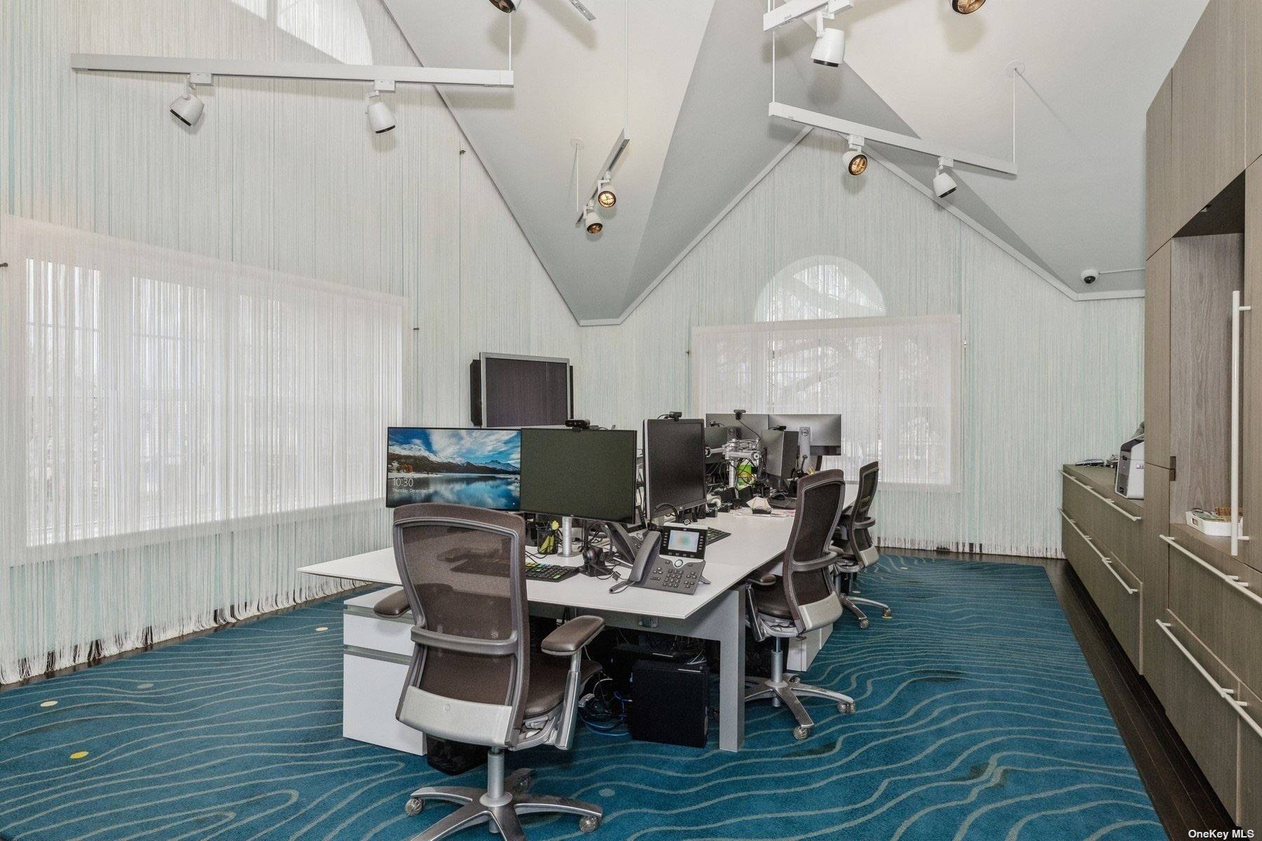 Second floor corner office overlooking Newtown Lane.