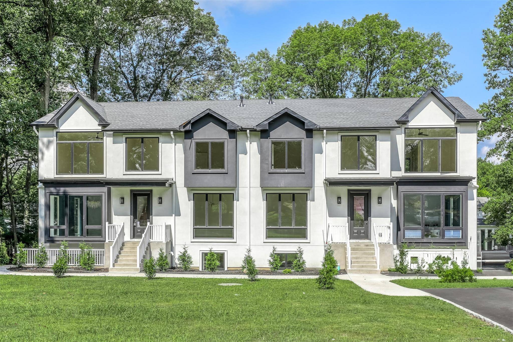 Step into nearly 5000 square feet of refined elegance in this newly constructed 8 bedroom, 7 bathroom townhouse, built in 2025 and nestled in the heart of Spring Valley.