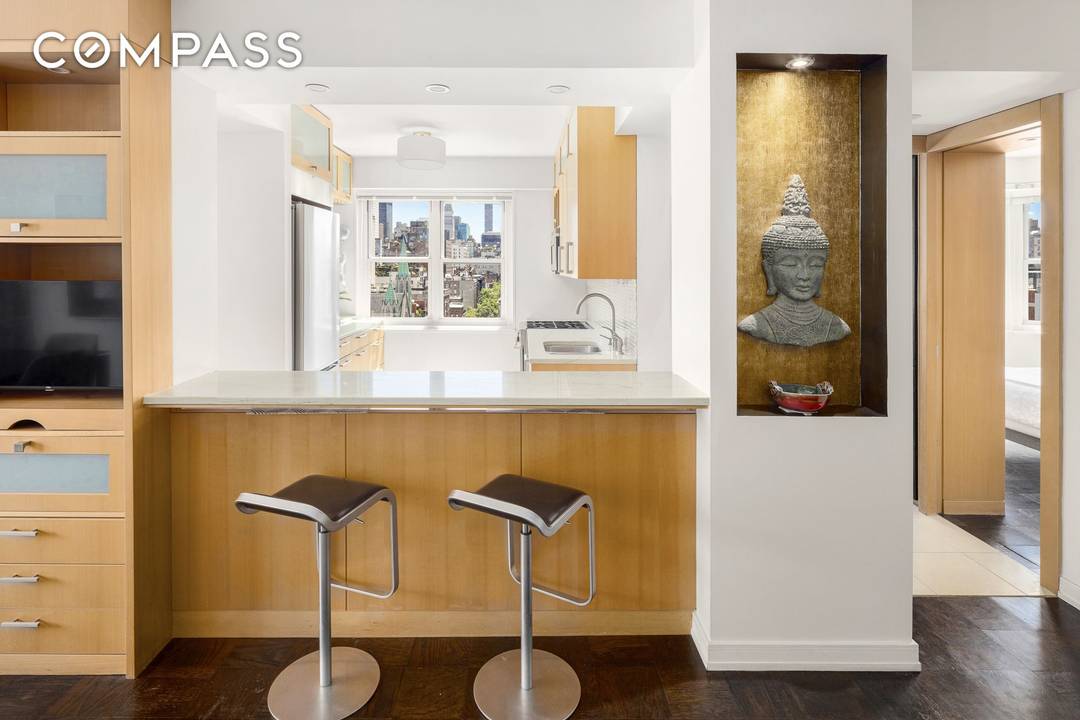 Perched 12 floors up on one of Chelsea s most coveted landmarked corners, this custom renovated two bedroom residence with the highest ceilings in the building captures some of downtown ...