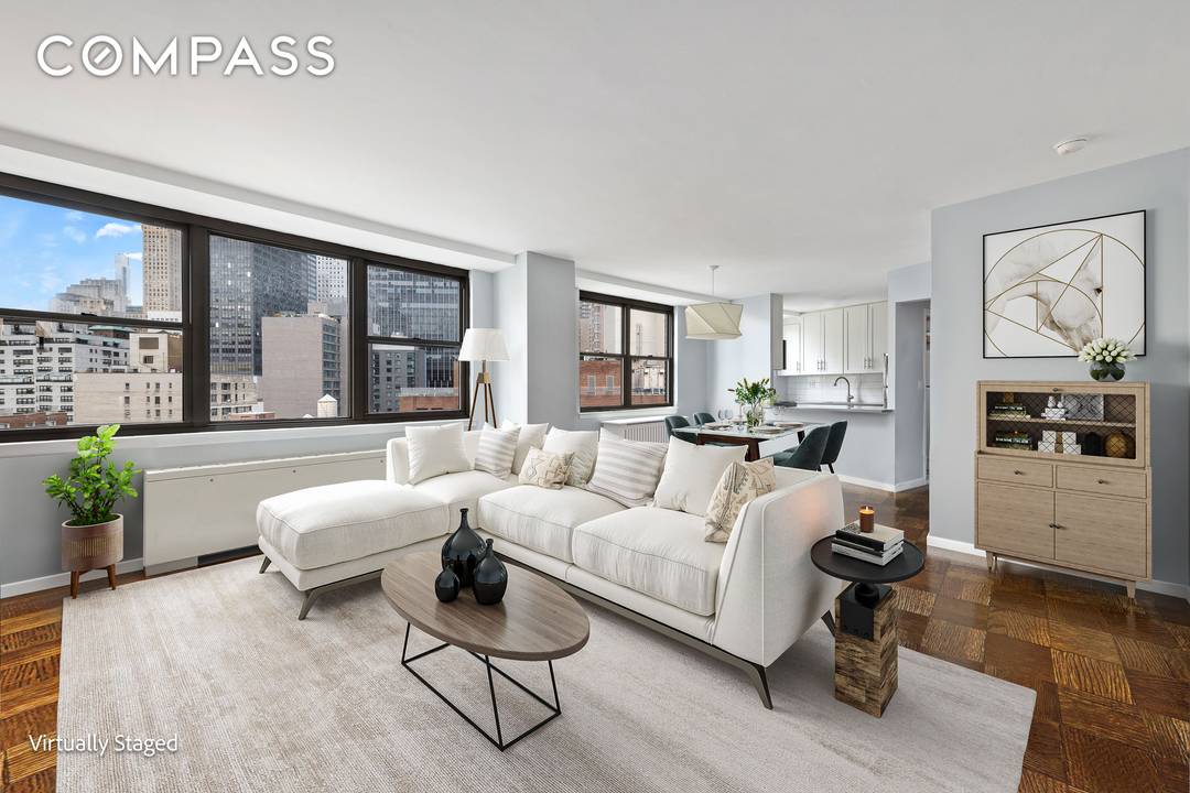 Mint high floor home with iconic views and a flexible layout, Residence 18M delivers sweeping Manhattan skyline vistas framing the Empire State and Chrysler Buildings through an expansive wall of ...