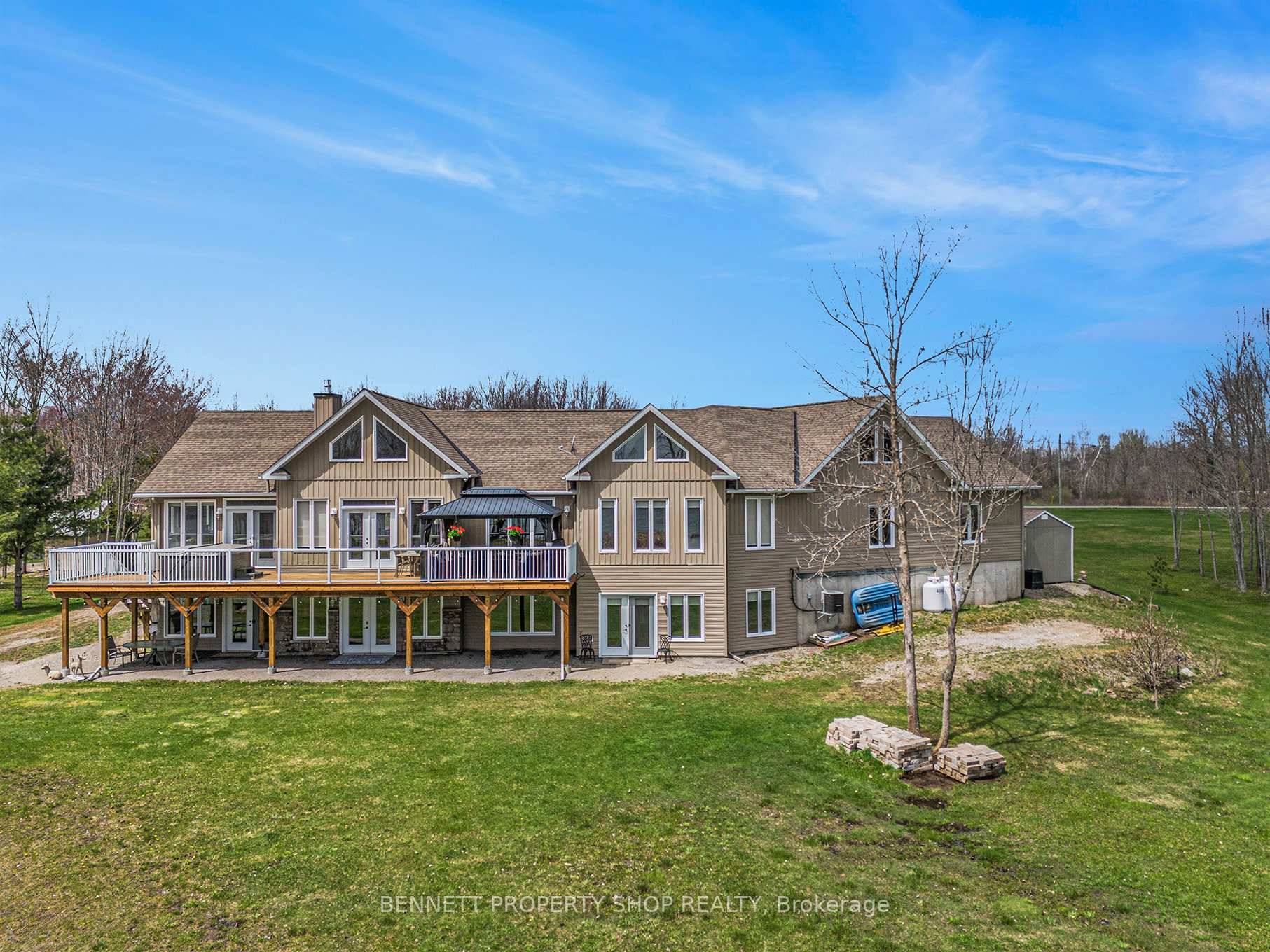 Stunning newer spacious 3780 sq ft WATERFRONT WALK OUT bungalow located in the exclusive community of West Point Estates, positioned on a private 2 acre lot on the Prestigious BIG ...