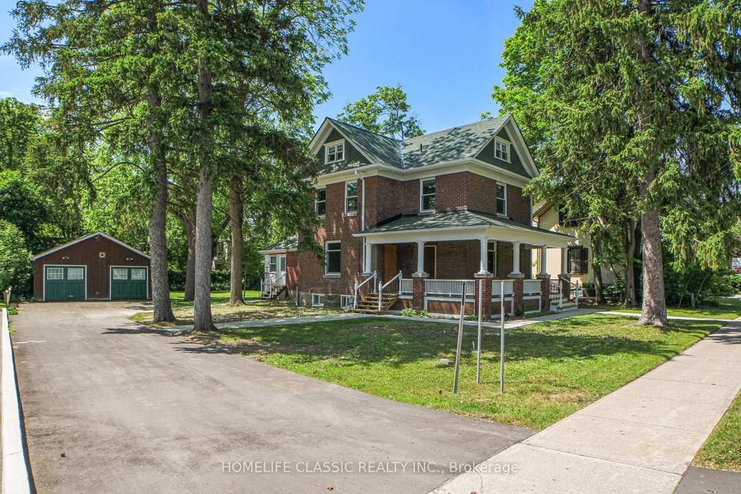 Completely Renovated from TOP to BOTTOM building legally divided to duplex residences.