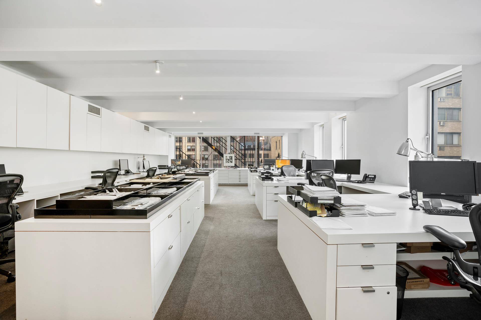 This incredibly bright and airy full floor loft is currently configured as a large open office and workspace and can easily be converted back to a residential home.
