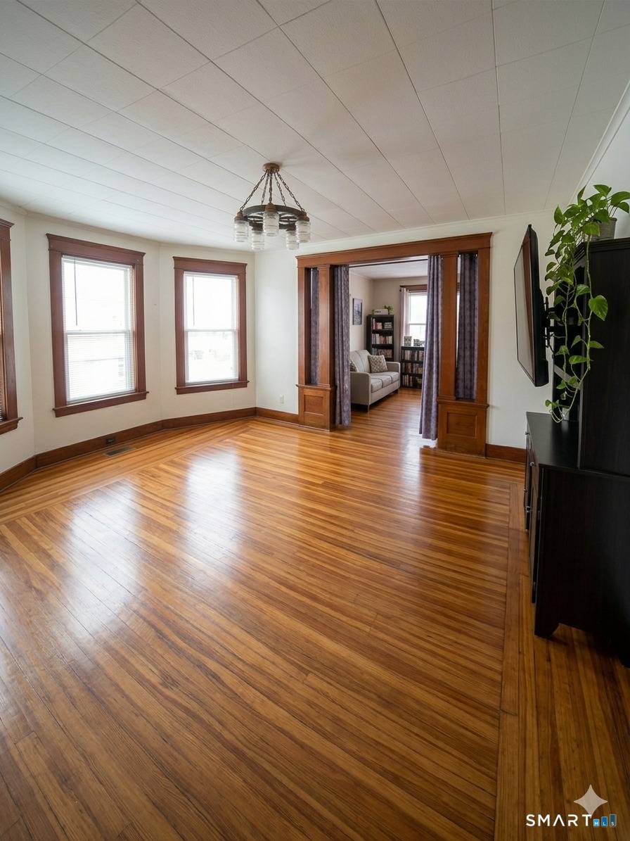 Well maintained three family property located in a quiet neighborhood, offering a stable and reliable investment opportunity.