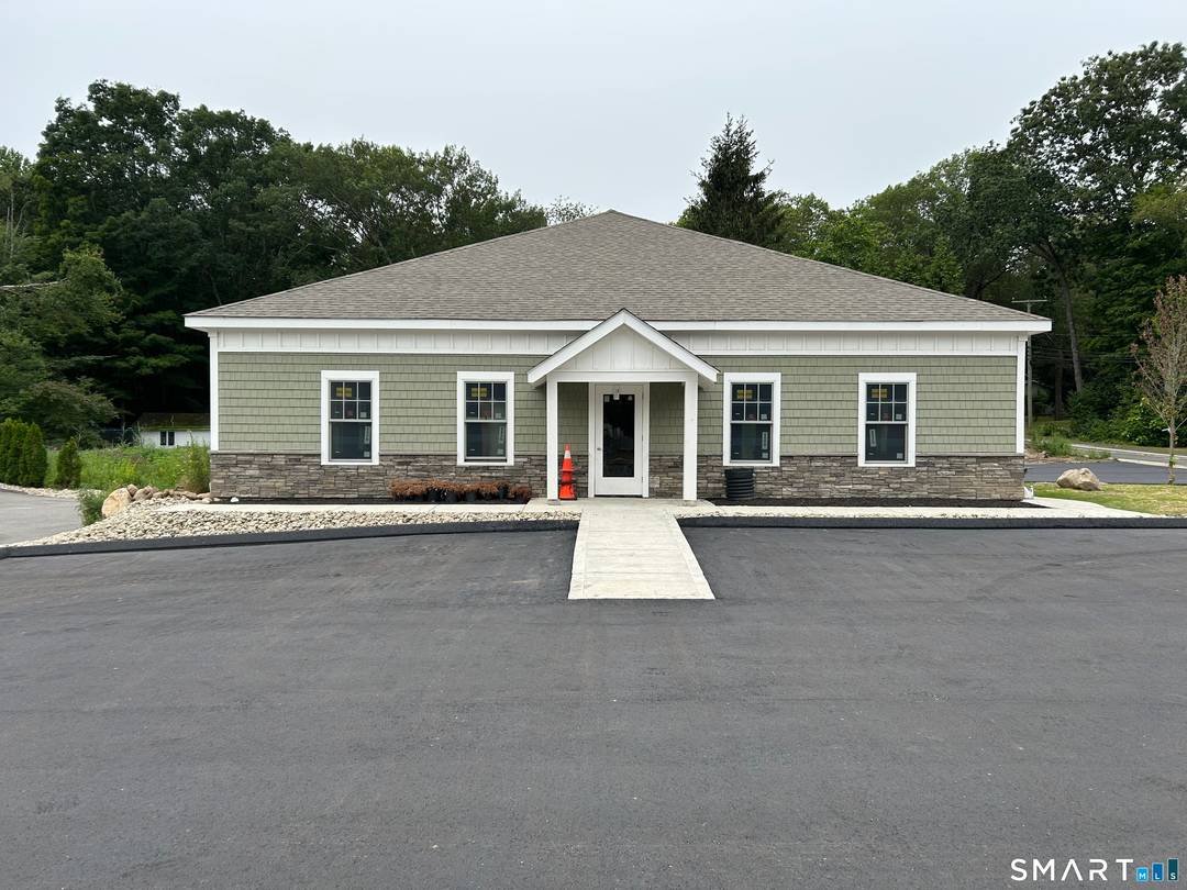 This impressive 10, 000 sq ft commercial property features two wellmaintained buildings positioned along a highly visible, hightraffic corridor, offering both immediate income and strong future potential.