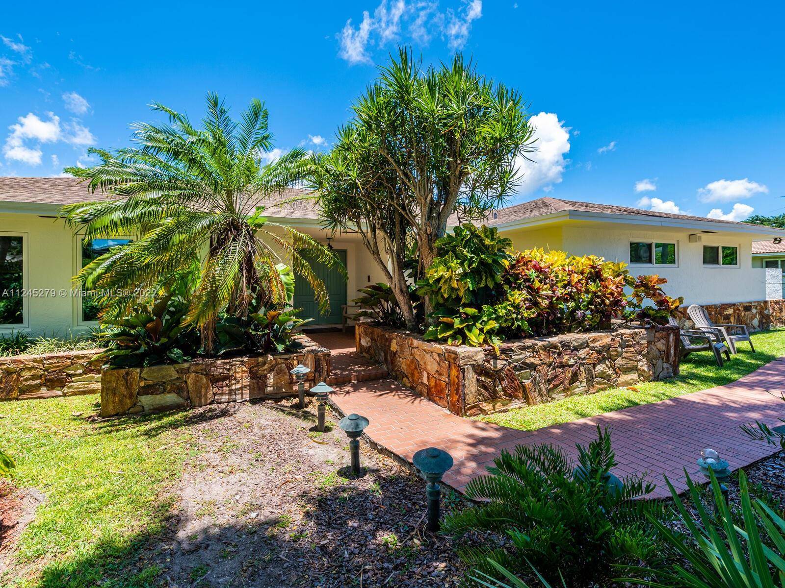 This lovely Falls area pool home sits on a builder's half acre.