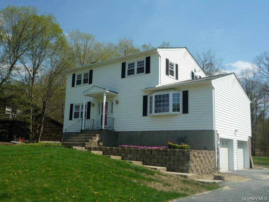 stunning 4 bedroom, 2 bath home, nestled on nearly half an acre of land.