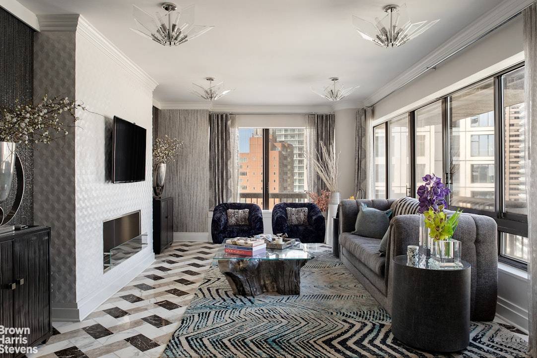 Completely renovated, this high floor one bedroom, one bathroom plus powder room home is superbly designed.