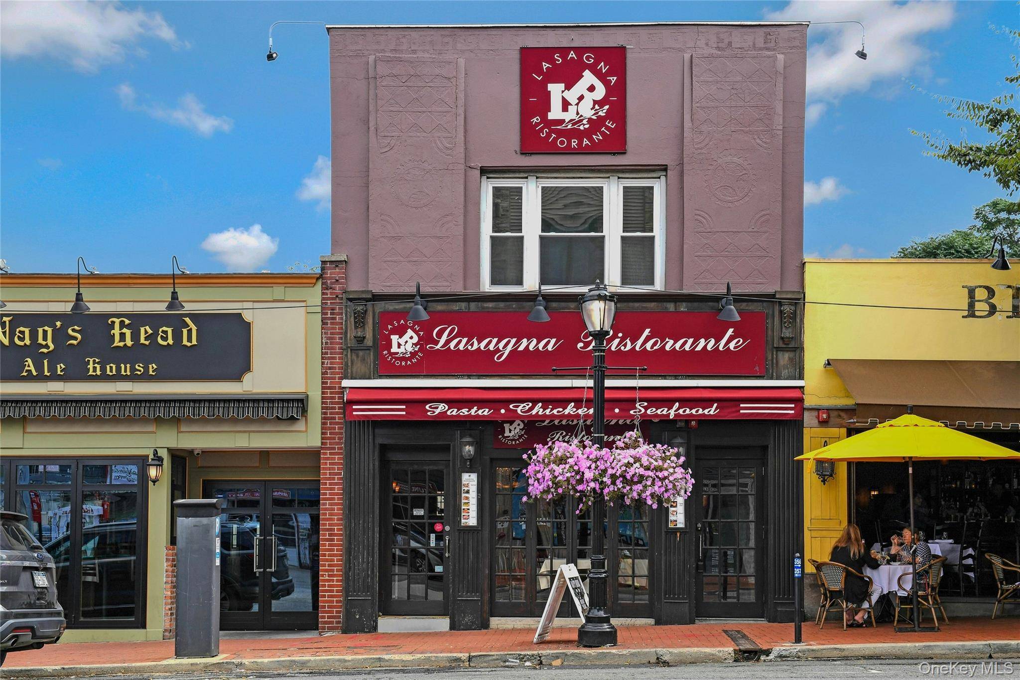 Rare opportunity to own a mixed use building on one of the most bustling streets in Huntington Village, next to Besito Restaurant and just a block south of The Paramount.