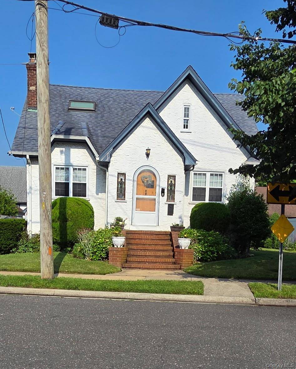 Welcome to this well maintained and inviting Charming Cape style home with Stained Glass Windows, located in the heart of Merrick, Long Island.