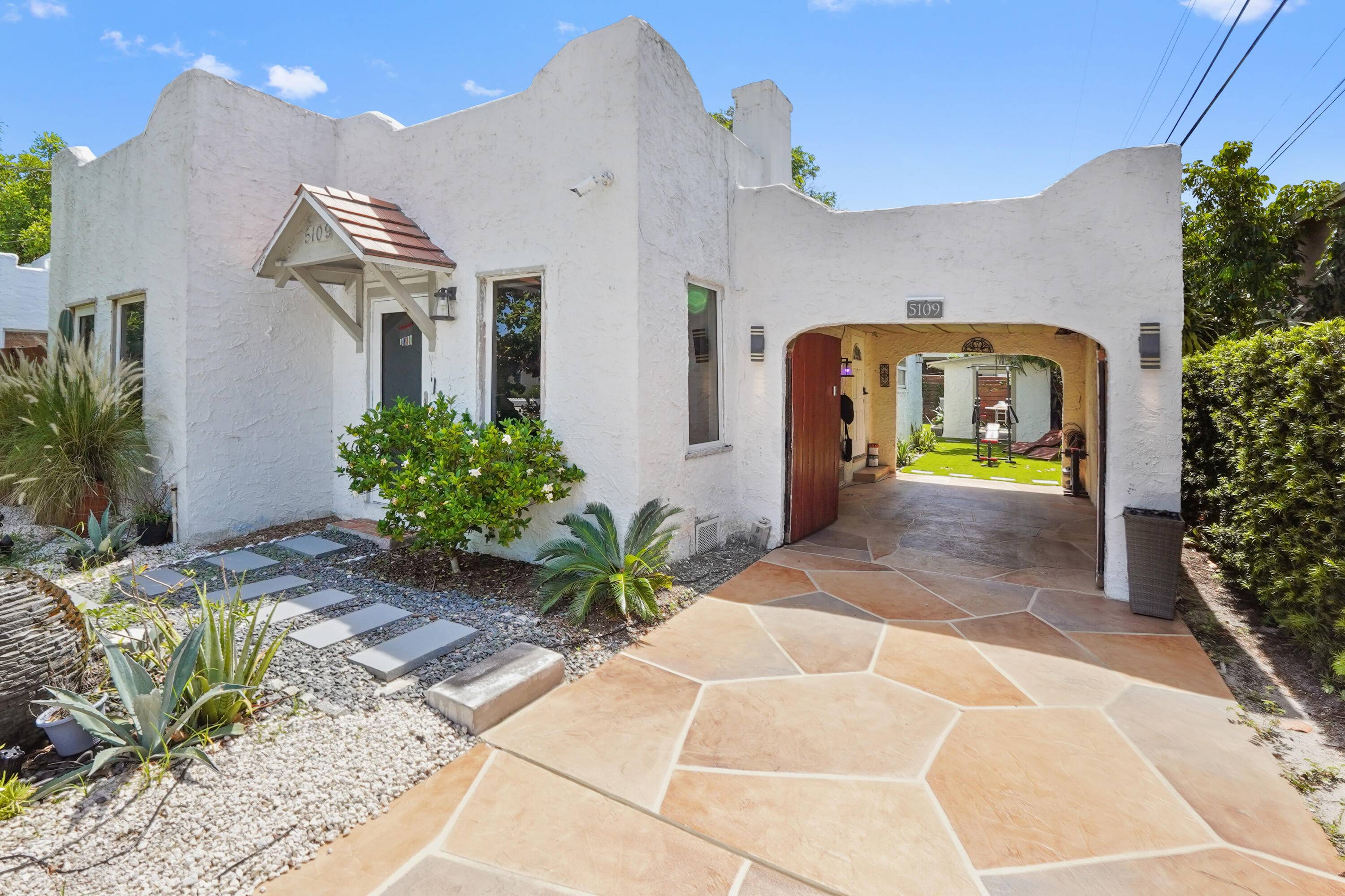 Step into this enchanting home, where beachy chic seamlessly blends with historic elegance.