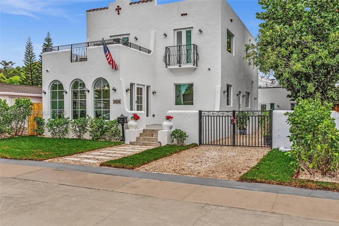 Beautifully renovated two story Mediterranean residence with a fully detached guest house.