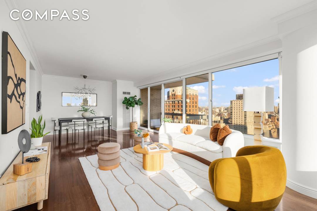 Welcome to 200 East 69th Street 29B, an expansive corner three bedroom, three bathroom residence perched high above the Upper East Side, offering sweeping panoramic views and refined modern living ...
