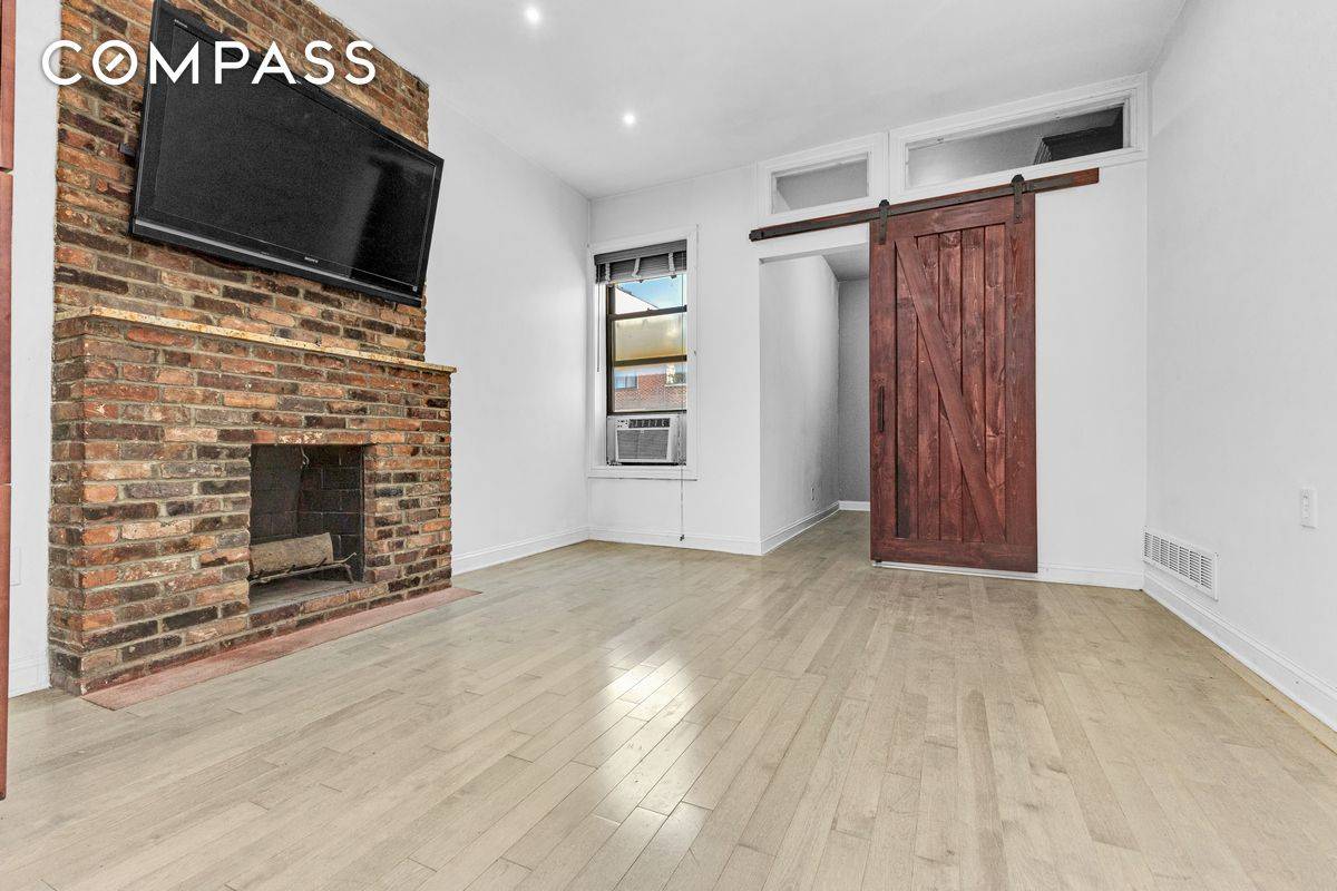 Live in the heart of Prospect Heights in this spacious convertible three bedroom, two bathroom home with private outdoor space in a boutique co op.